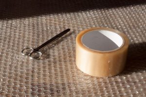 Scissors, duct tape, and bubble wrap.