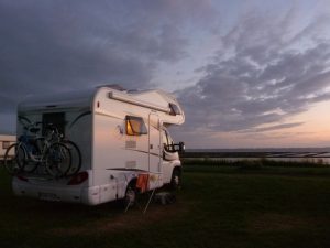 An RV and the sunset.